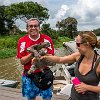 The best way to hold a sloth is the way I'm showing here. You don't want their claws to grab you. A melhor maneira de segurar uma preguiça é como estou mostrando aqui. Você não quer que as garras dela de pegue. : Amazonas, Brazil, Manaus