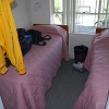 My room with the porch in the background. Meu quarto com a varanda ao fundo.