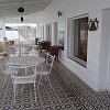 The enclosed porch. Look at the tiles throughout the house. A varanda. Veja o piso por toda a casa.