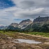 A view of the Highline Trail way in the distance on the right. Vista do trilha Highline ao fundo à distância. : Glacier NP, Hidden Lake, vacation 2014