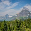 Right after the first elevation gain, we begin seeing views of Mount Grinnel (8,851 ft) and Mount Wilbur (9,321 ft). Logo após a primeira elevação, começamos a ver panoramas do Monte Grinnel (2.700 m) e Monte Wilbur (2.841 m). : Glacier NP, Ptarmigan Tunnel, vacation 2014