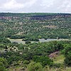 The field is covered with Bluebonnets.<br>O campo lá embaixo está coberto com Bluebonnets.
