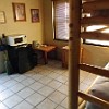 The other room at the front of the cabin. O outro quarto na frente do chalé.